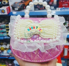 TÚI DẠ CẦM TAY HỒNG NƠ NGỌC TRAI CHO BÉ GÁI VÍ MINI CẦM TAY
