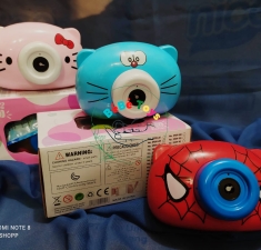 Máy ảnh bắn bong bóng người nhện, mèo Hello Kitty, Dooraemon pin nhạc đèn các loại